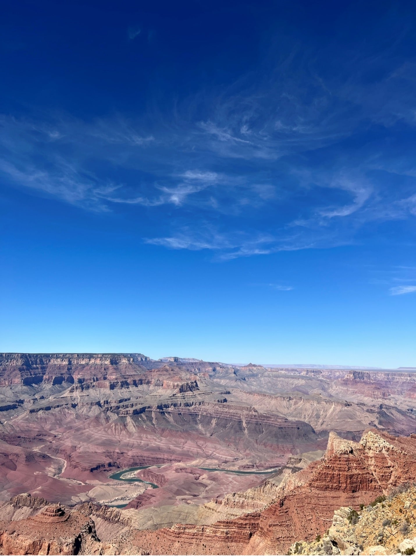 A blue sky above a canyon