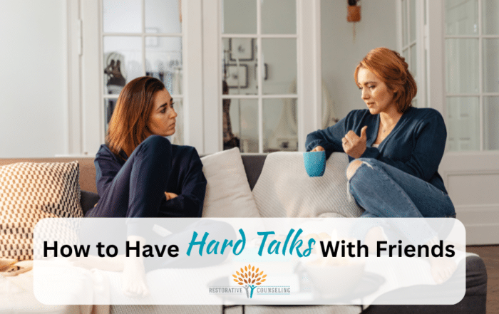 Two friends having a hard talk while sitting on a couch. end id